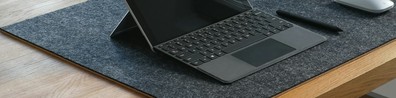 Black Laptop On The Floor - Free LinkedIn Background Photo