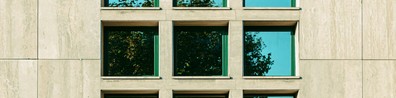 Concrete Building With Square Glass Windows - Free LinkedIn Background Photo
