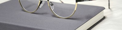 Eyeglass On Top Of Notebooks - Free LinkedIn Background Photo