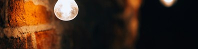 Lamp Bulb On Brick Wall - Free LinkedIn Background Photo