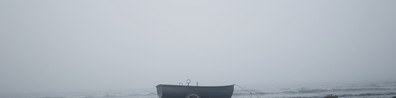 black shipwreck on gray sea - Free LinkedIn Background Photo